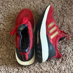 adidas Hunger Games Red Knit Sneakers with Gold Accents